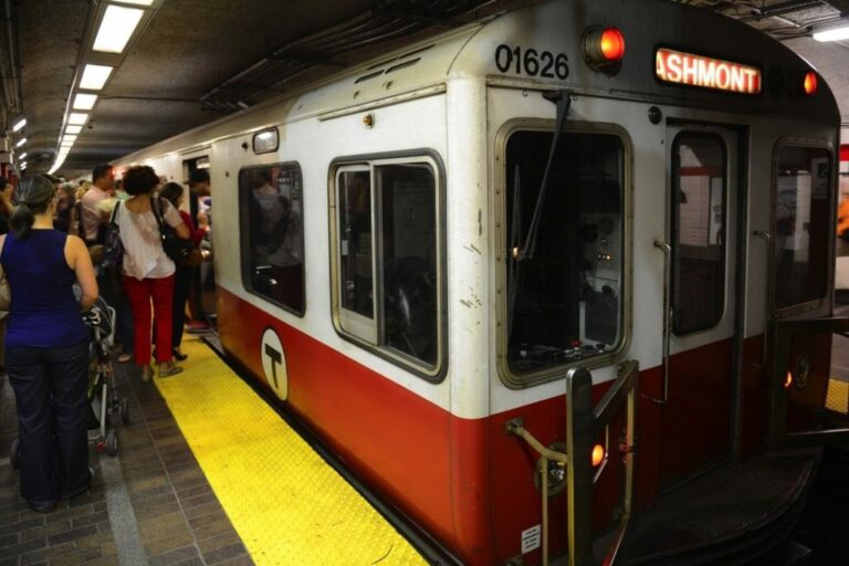 People walking towards the train
